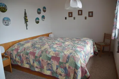 Ein Bett oder Betten in einem Zimmer der Unterkunft Ferienhaus Kroll Thiemen