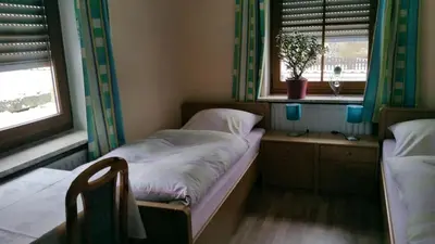Ein Bett oder Betten in einem Zimmer der Unterkunft Haus Eva