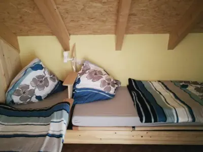 Ein Bett oder Betten in einem Zimmer der Unterkunft Erzgebirgsferienwohnung
