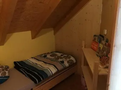 Ein Bett oder Betten in einem Zimmer der Unterkunft Erzgebirgsferienwohnung