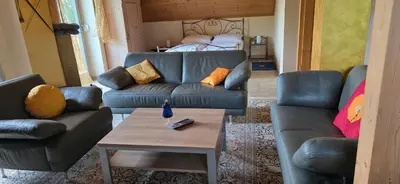 Ein Sitzbereich in der Unterkunft Haus Sonnhof