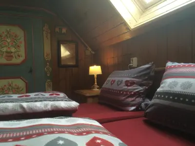 Ein Bett oder Betten in einem Zimmer der Unterkunft Die Adlerhütte