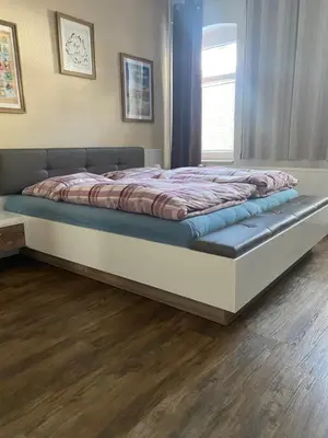 Ein Bett oder Betten in einem Zimmer der Unterkunft Das Rübezahl