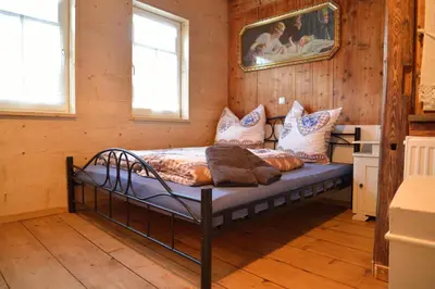 Ein Bett oder Betten in einem Zimmer der Unterkunft Fw. Steindöbra Anno Dazumal