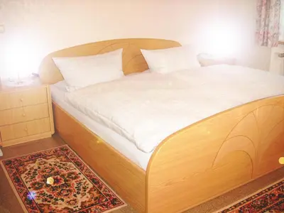 Ein Bett oder Betten in einem Zimmer der Unterkunft Ferienwohnung Kappauf / Petrik