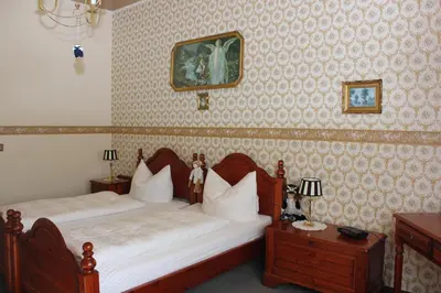 Ein Bett oder Betten in einem Zimmer der Unterkunft Pension Vogtländer
