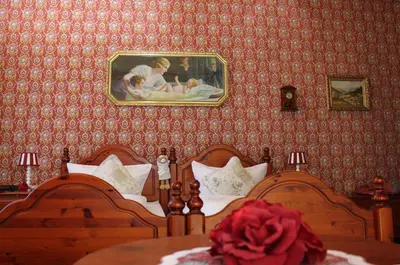 Ein Bett oder Betten in einem Zimmer der Unterkunft Pension Vogtländer