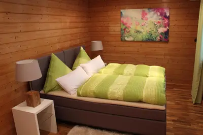 Ein Bett oder Betten in einem Zimmer der Unterkunft Pension Stauber