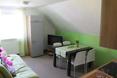 Ein Sitzbereich in der Unterkunft Pension Stauber