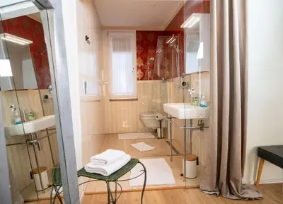 Ein Badezimmer in der Unterkunft Boutique Hotel Frieden