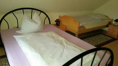 Ein Bett oder Betten in einem Zimmer der Unterkunft Ferienhaus Riedl