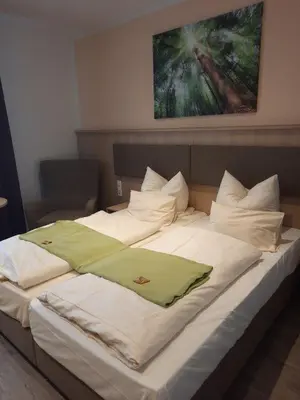 Ein Bett oder Betten in einem Zimmer der Unterkunft Rathausstuben