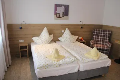 Ein Bett oder Betten in einem Zimmer der Unterkunft Rathausstuben