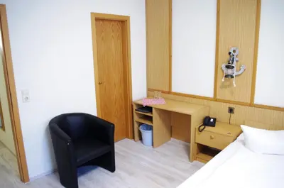 Ein Bett oder Betten in einem Zimmer der Unterkunft Hotel Gasthof zum Walfisch