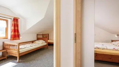 Ein Bett oder Betten in einem Zimmer der Unterkunft Ferienhaus Zillendorf