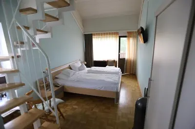 Ein Bett oder Betten in einem Zimmer der Unterkunft Gasthof - Pension Krämerhof