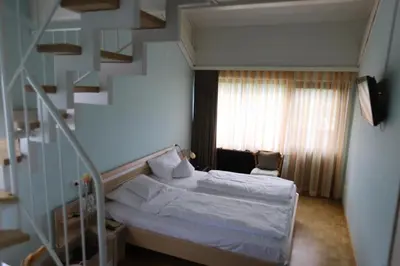 Ein Bett oder Betten in einem Zimmer der Unterkunft Gasthof - Pension Krämerhof
