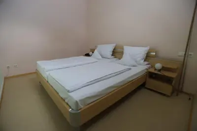 Ein Bett oder Betten in einem Zimmer der Unterkunft Gasthof - Pension Krämerhof