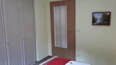 Ein Bett oder Betten in einem Zimmer der Unterkunft Ferienwohnungen Villa Goldbrunnen