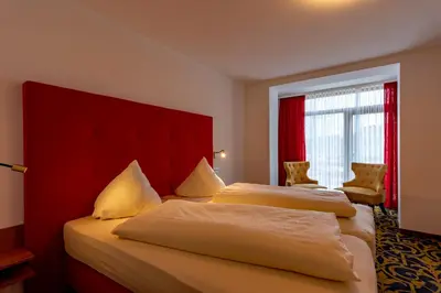 Ein Bett oder Betten in einem Zimmer der Unterkunft Hotel Wurzer