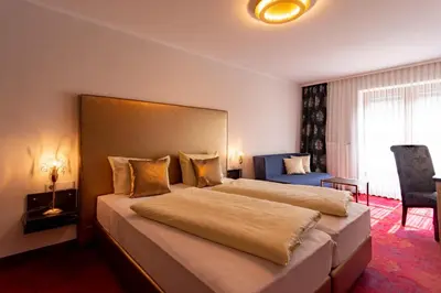 Ein Bett oder Betten in einem Zimmer der Unterkunft Hotel Wurzer