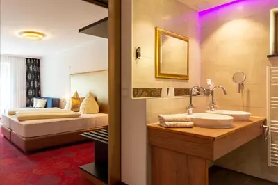 Ein Bett oder Betten in einem Zimmer der Unterkunft Hotel Wurzer