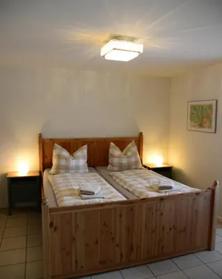 Ein Bett oder Betten in einem Zimmer der Unterkunft Ferienhaus Oberwiesenthal
