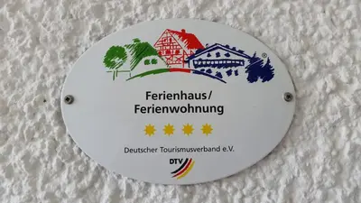 Ein Zertifikat, Auszeichnung, Logo oder anderes Dokument, das in der Unterkunft Ferienwohnung Sonja ausgestellt ist