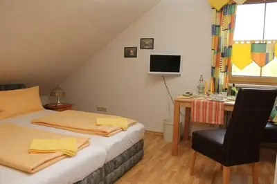 Ein Bett oder Betten in einem Zimmer der Unterkunft Ferienwohnungen Sonnleite