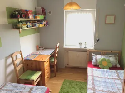 Ein Bett oder Betten in einem Zimmer der Unterkunft Monis Ferienwohnung