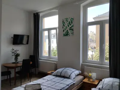 Ein Bett oder Betten in einem Zimmer der Unterkunft Pension Eberhart