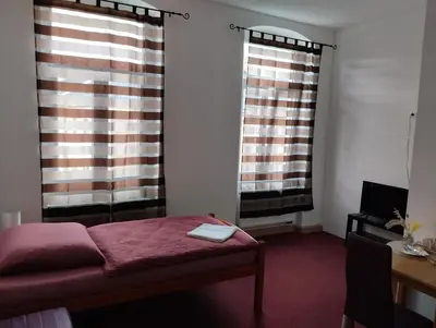 Ein Bett oder Betten in einem Zimmer der Unterkunft Pension Eberhart
