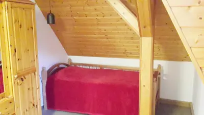 Ein Bett oder Betten in einem Zimmer der Unterkunft Villa Goldbrunnen Ferienwohnung 3
