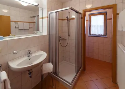 Ein Badezimmer in der Unterkunft Panorama-Hotel am See