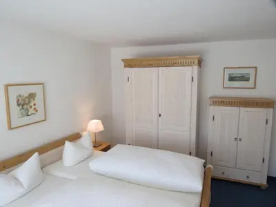 Ein Bett oder Betten in einem Zimmer der Unterkunft Ferienhotel Mühlleithen