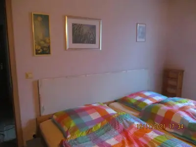 Ein Bett oder Betten in einem Zimmer der Unterkunft Ferienwohnung Troglauer
