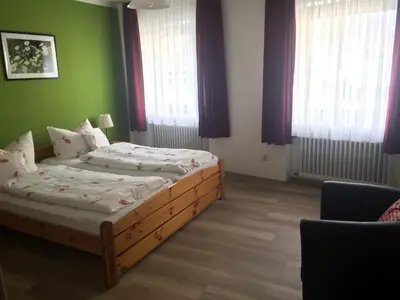 Ein Bett oder Betten in einem Zimmer der Unterkunft Landgasthof Zum goldenen Löwen