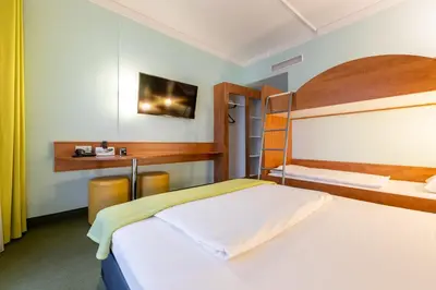 Ein Bett oder Betten in einem Zimmer der Unterkunft Hotel Fränkische Schweiz-Pegnitz