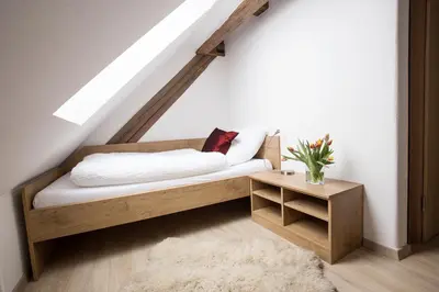 Ein Bett oder Betten in einem Zimmer der Unterkunft Fischhof Beer