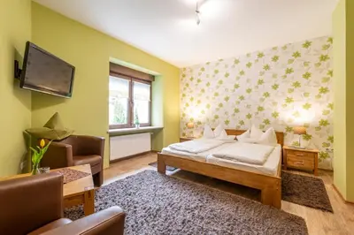 Ein Bett oder Betten in einem Zimmer der Unterkunft Pension Gisela