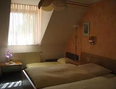Ein Bett oder Betten in einem Zimmer der Unterkunft Hotel-Gasthof 