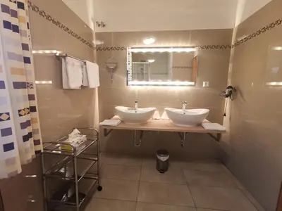 Ein Badezimmer in der Unterkunft Haus am Kurpark Hotel Garni