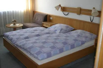 Ein Bett oder Betten in einem Zimmer der Unterkunft Gasthof Napoleon