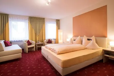 Ein Bett oder Betten in einem Zimmer der Unterkunft Hotel Gasthof Zur Post