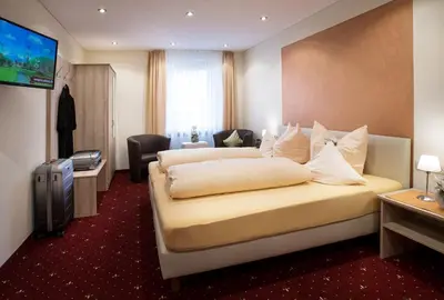 Ein Sitzbereich in der Unterkunft Hotel Gasthof Zur Post