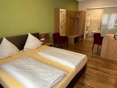 Ein Bett oder Betten in einem Zimmer der Unterkunft Zum Waldnaabtal