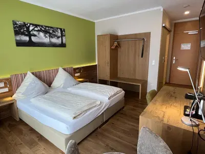 Ein Bett oder Betten in einem Zimmer der Unterkunft Zum Waldnaabtal