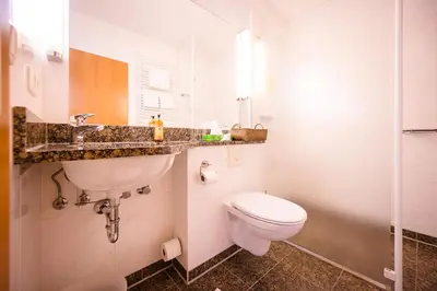 Ein Badezimmer in der Unterkunft Brauereigasthof-Jakob