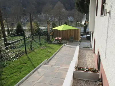 Ein Garten an der Unterkunft Apartments in Behringersmühle