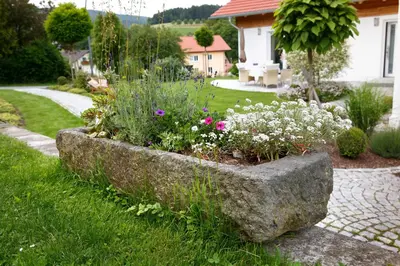 Ein Garten an der Unterkunft Ferienhaus Schlamminger